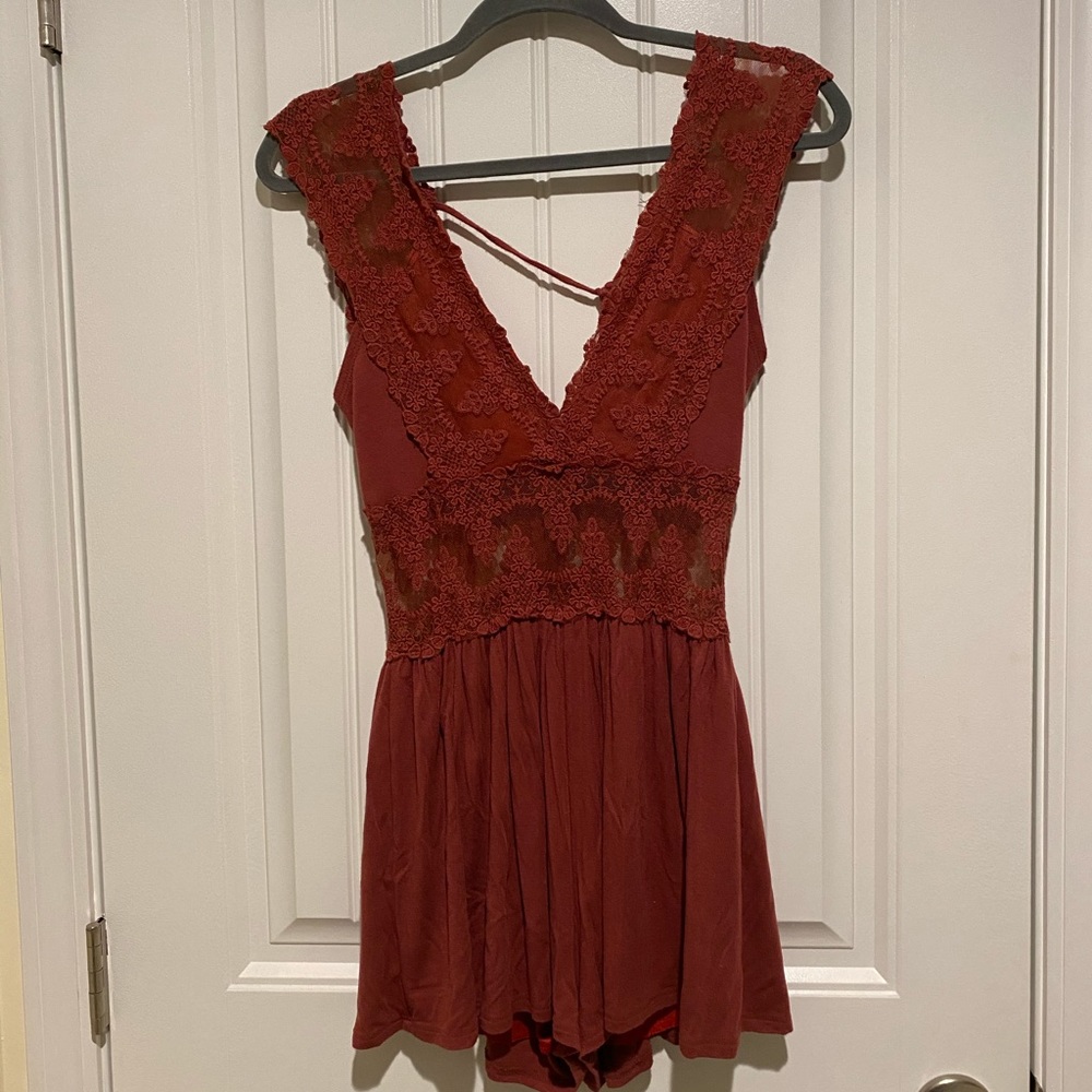 LACE & slouchy-yet, the perfect hip hugging romper! One of a kind!